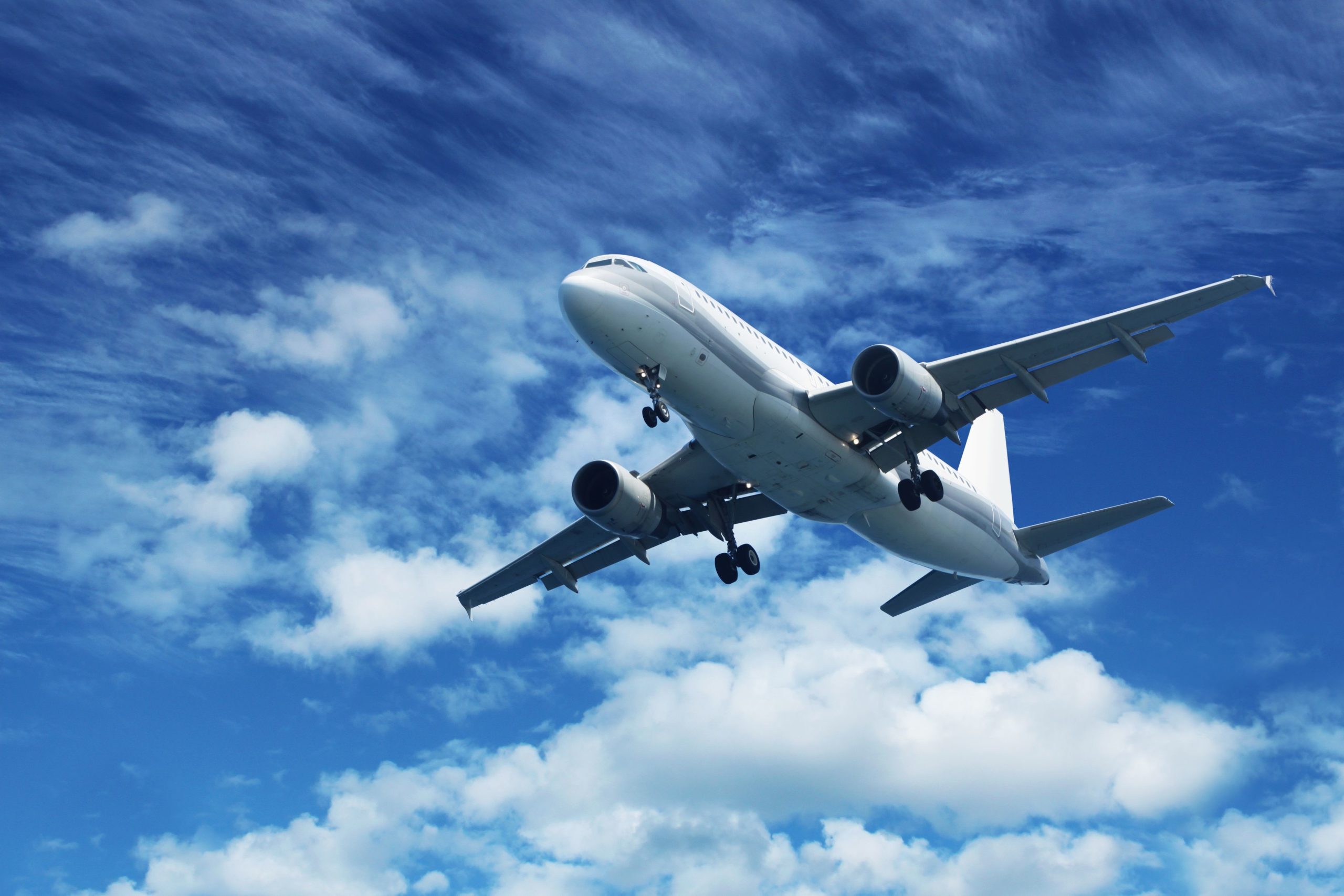 16259734 - passenger air plane flying on blue sky white clouds background
